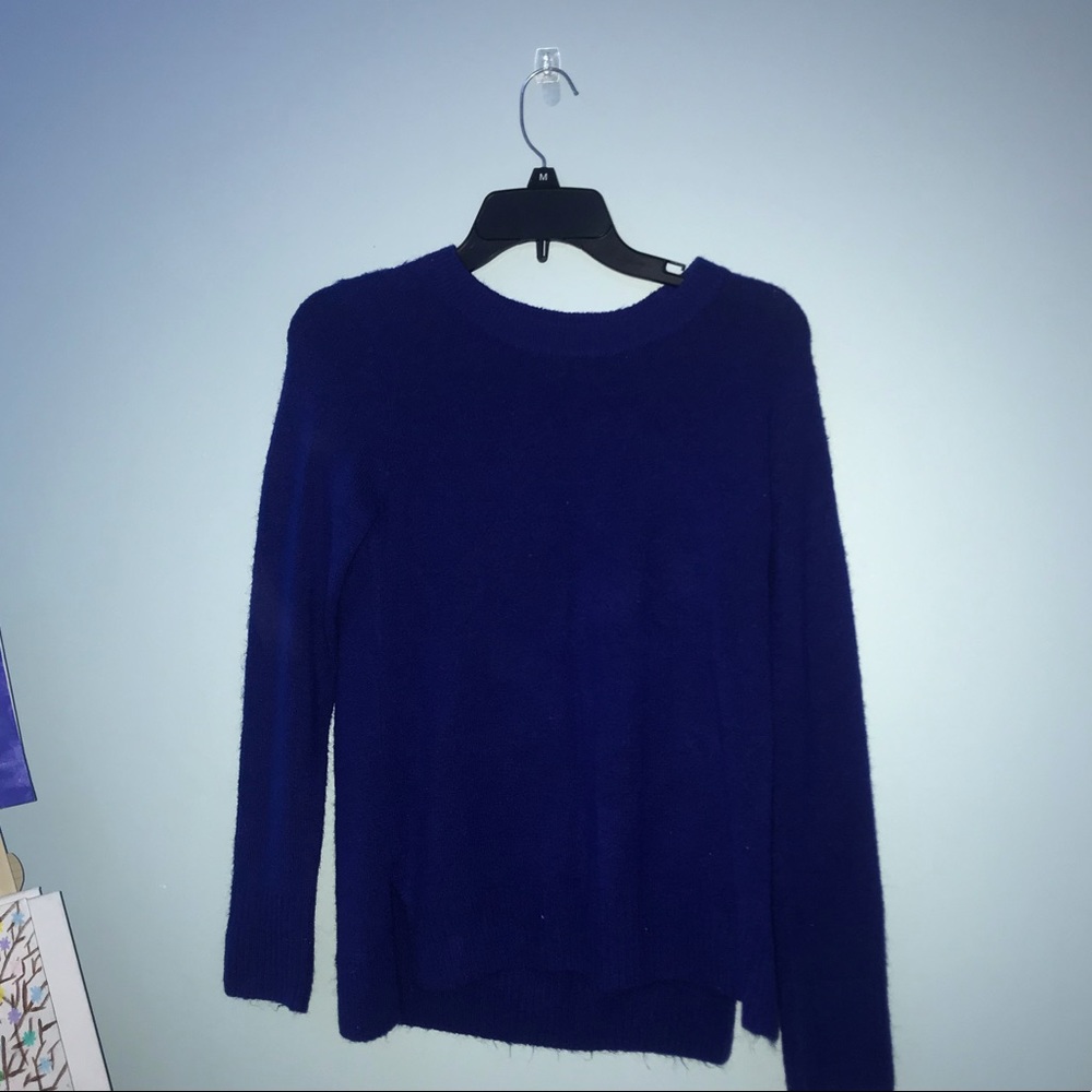 Blue sweater.